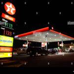 Texaco Garage And CO OP Convenience Store At Night UK Stock Photo Alamy