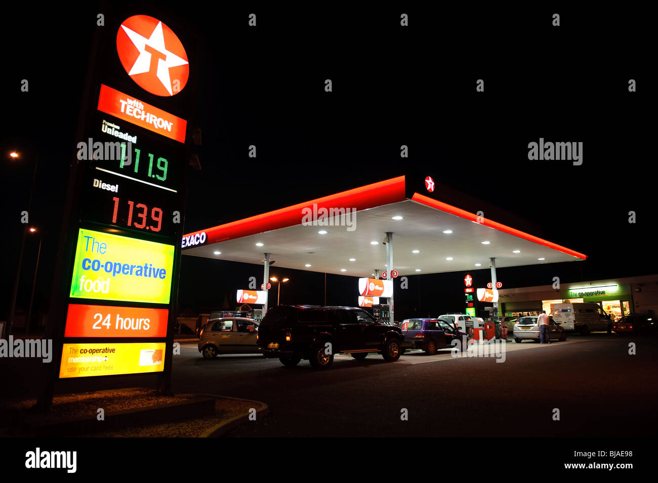 Texaco Garage And CO OP Convenience Store At Night UK Stock Photo Alamy