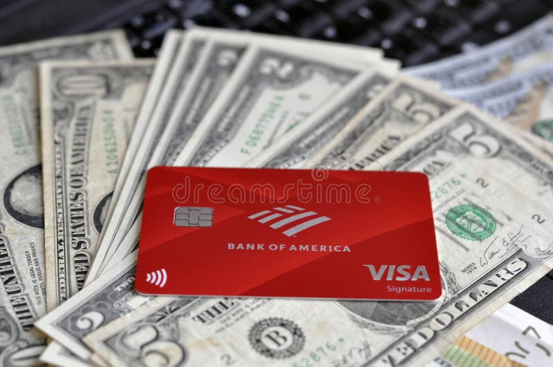 Bank Of America Visa Payment System Card On A Laptop With US Dollars 